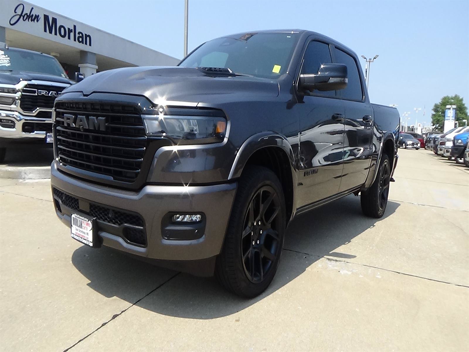 Used 2025 RAM 1500 Laramie w/ Night Edition AWD/4WD image 2