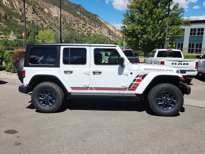 New 2026 Jeep Wrangler Unlimited Sport w/ Dual Top Group