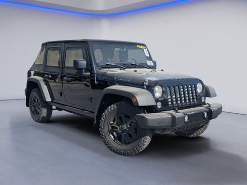 Used 2014 Jeep Wrangler Unlimited Sport image 1