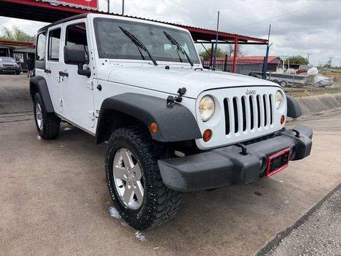 Used 2012 Jeep Wrangler Unlimited Sport image 1