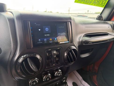 Used 2014 Jeep Wrangler Unlimited Sahara w/ Dual Top Group AWD/4WD image 34