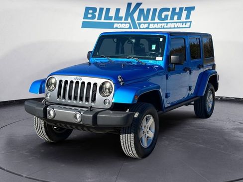 Used 2014 Jeep Wrangler Unlimited Sport image 1