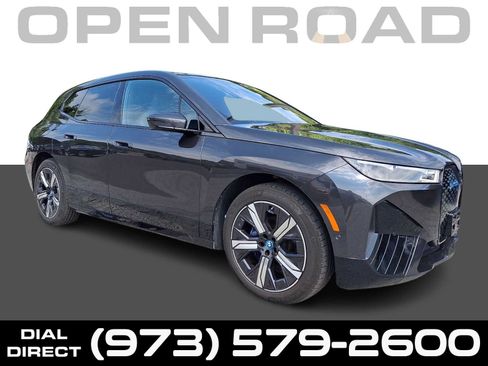 Used 2024 BMW iX xDrive50 w/ Premium Package AWD/4WD image 1
