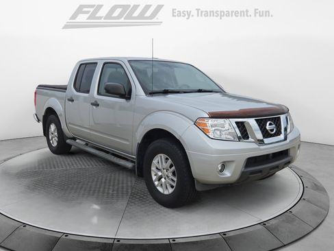 Used 2014 Nissan Frontier SV w/ SV Value Truck Package AWD/4WD image 1