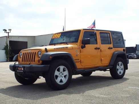 Used 2012 Jeep Wrangler Unlimited Sport AWD/4WD image 1