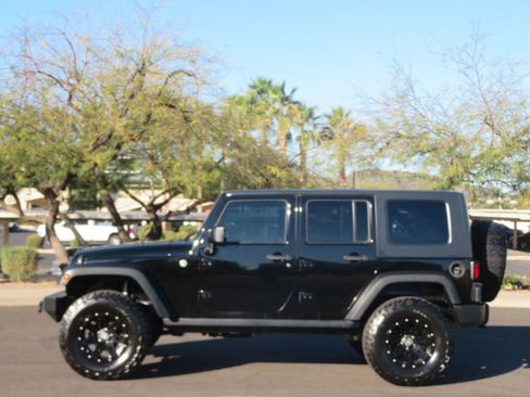 Used 2009 Jeep Wrangler Unlimited Rubicon w/ Dual Top Group image 2