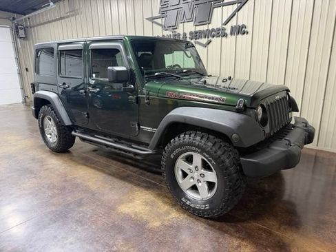 Used 2012 Jeep Wrangler Unlimited Rubicon w/ Dual Top Group AWD/4WD image 6