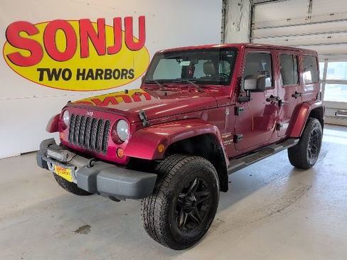 Used 2012 Jeep Wrangler Unlimited Sahara w/ Trailer Tow Group AWD/4WD image 1