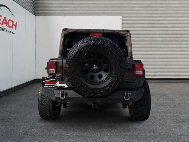 Used 2013 Jeep Wrangler Unlimited Sport w/ Connectivity Group AWD/4WD image 4