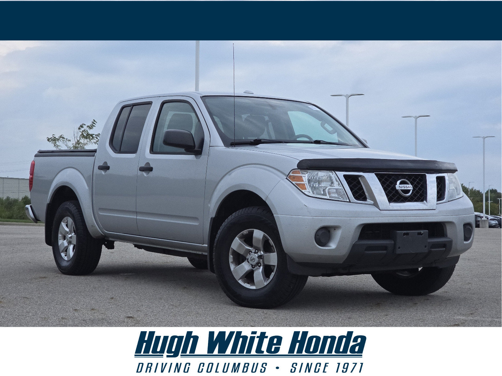 Used 2012 Nissan Frontier SV w/ SV Premium Utility Pkg AWD/4WD image 1
