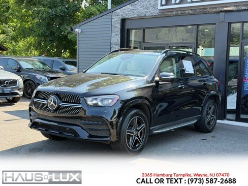Used 2021 Mercedes-Benz GLE 450 4MATIC w/ AMG Line Exterior image 4