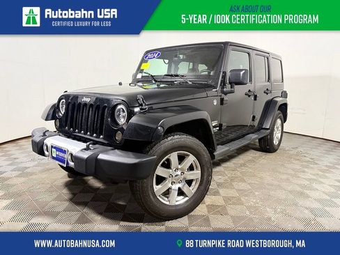 Used 2014 Jeep Wrangler Unlimited Sahara w/ Dual Top Group AWD/4WD image 1