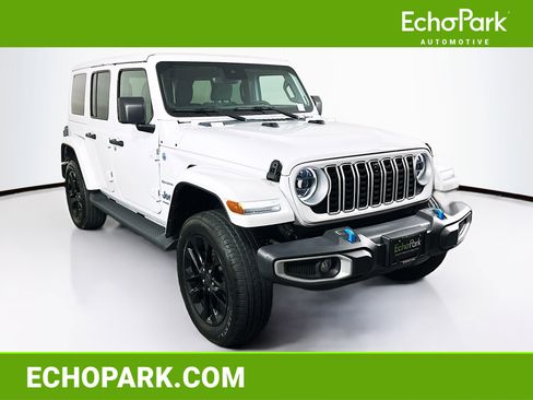 Used 2024 Jeep Wrangler Sahara w/ Technology Group image 1