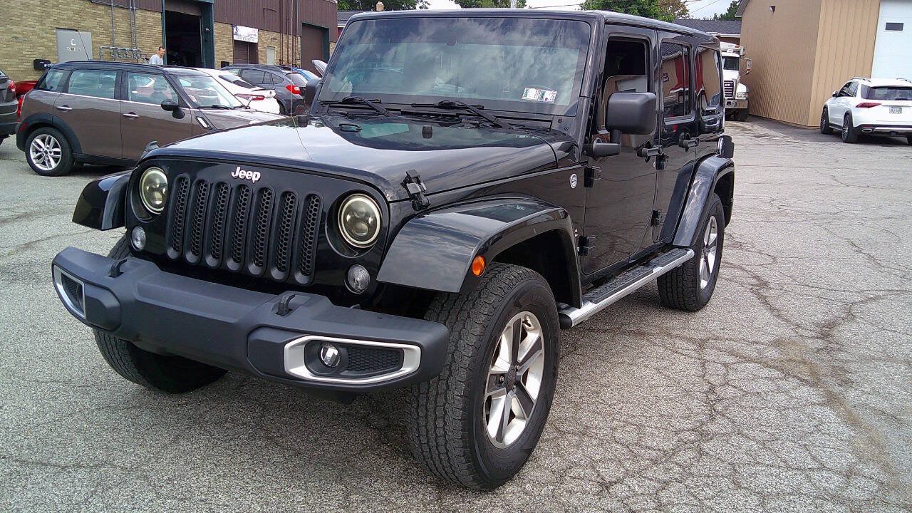 Used 2014 Jeep Wrangler Unlimited Sahara w/ Dual Top Group AWD/4WD image 1