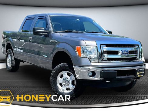 Used 2013 Ford F150 XLT AWD/4WD image 1
