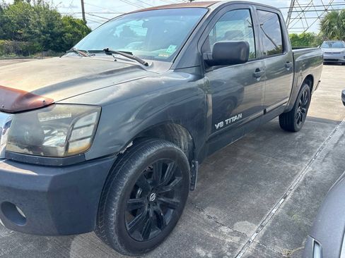 Used 2009 Nissan Titan SE RWD image 1