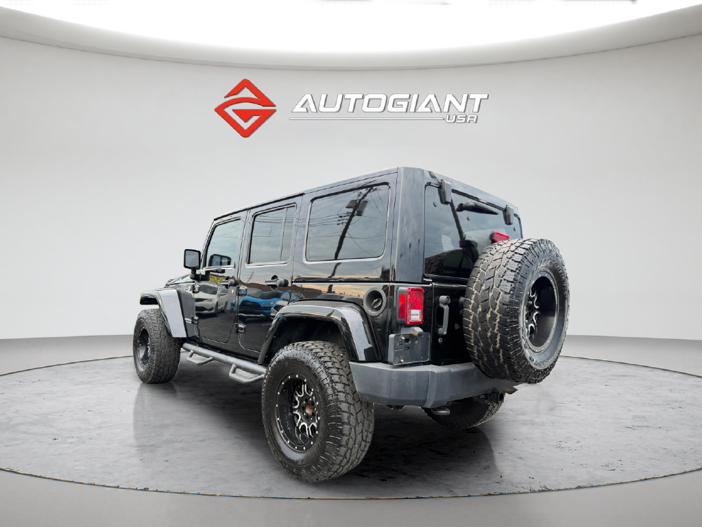 Used 2012 Jeep Wrangler Unlimited Rubicon w/ Dual Top Group AWD/4WD image 6