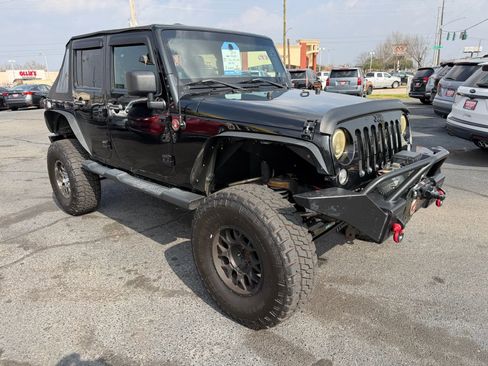 Used 2014 Jeep Wrangler Unlimited Sahara AWD/4WD image 16