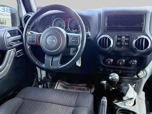 Used 2012 Jeep Wrangler Unlimited Sport AWD/4WD image 16