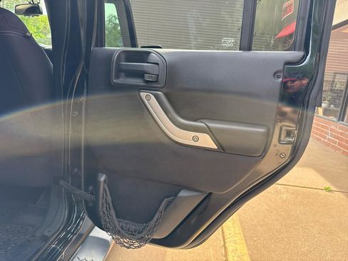 Used 2013 Jeep Wrangler Unlimited Sahara AWD/4WD image 26