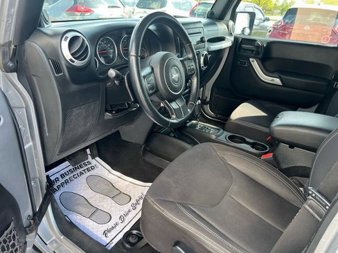 Used 2013 Jeep Wrangler Unlimited Sahara w/ Dual Top Group AWD/4WD image 15