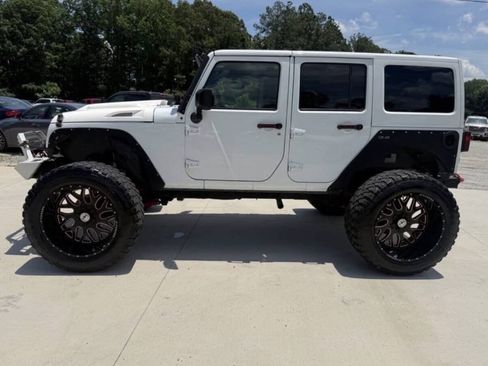 Used 2015 Jeep Wrangler Unlimited Rubicon w/ Dual Top Group AWD/4WD image 4