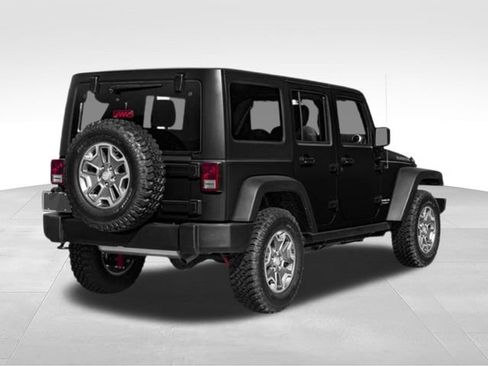 Used 2015 Jeep Wrangler Unlimited Rubicon w/ Dual Top Group AWD/4WD image 2