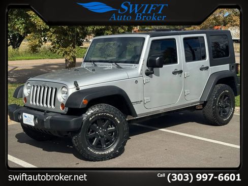 Used 2010 Jeep Wrangler Unlimited Sport image 1