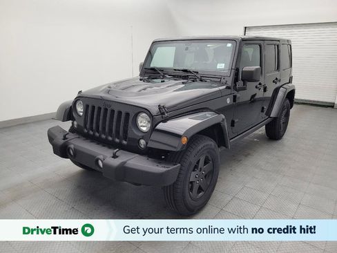 Used 2015 Jeep Wrangler Unlimited Sahara AWD/4WD image 1
