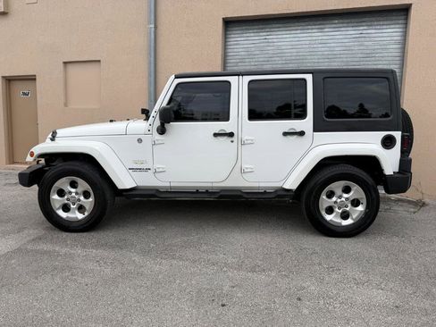 Used 2014 Jeep Wrangler Unlimited Sahara AWD/4WD image 9
