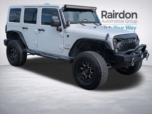 Used 2014 Jeep Wrangler Unlimited Sahara w/ Max Tow Package AWD/4WD image 1