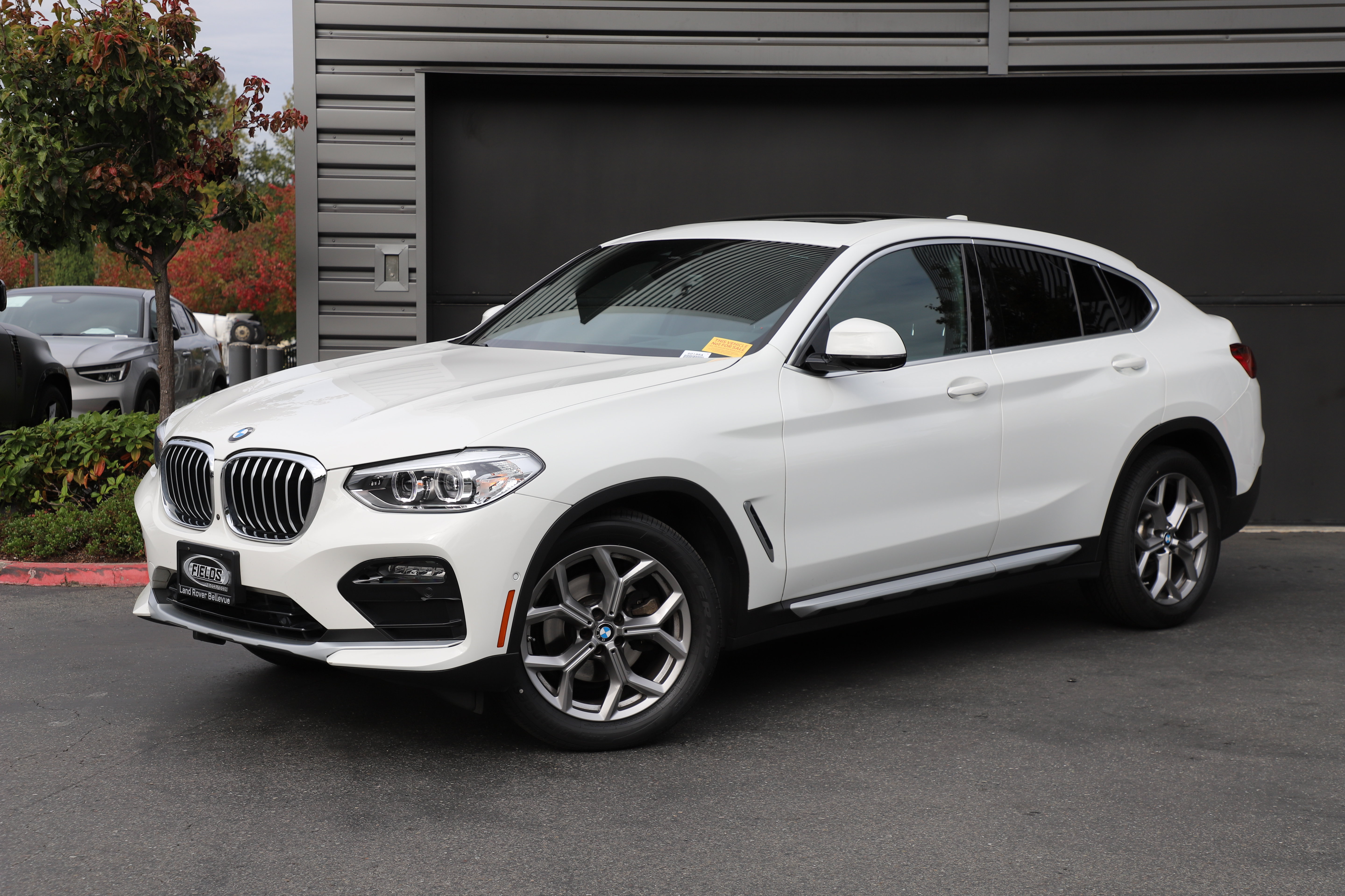 Used 2021 BMW X4 xDrive30i w/ Premium Package AWD/4WD image 1