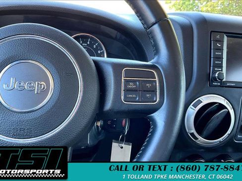 Used 2014 Jeep Wrangler Unlimited Sahara w/ Dual Top Group AWD/4WD image 17