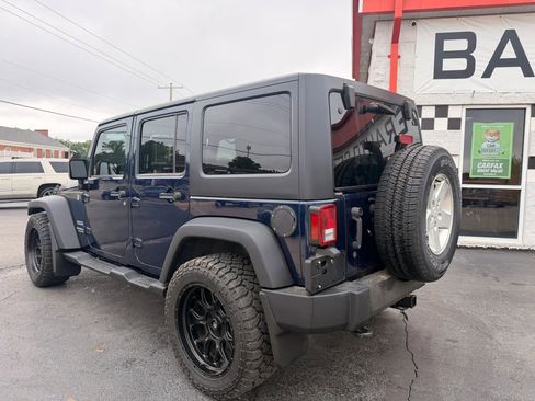 Used 2013 Jeep Wrangler Unlimited Sport AWD/4WD image 2