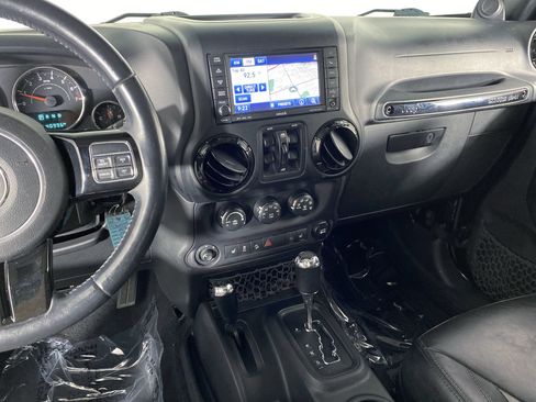 Used 2014 Jeep Wrangler Unlimited Sahara AWD/4WD image 24