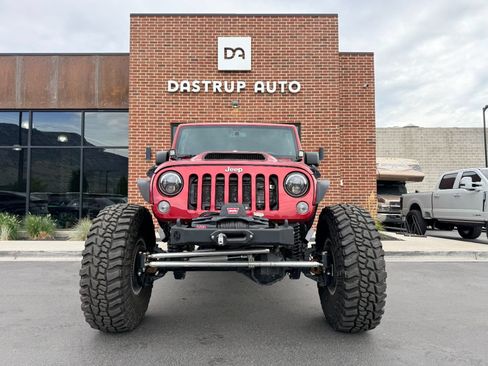 Used 2013 Jeep Wrangler Unlimited Rubicon w/ Dual Top Group AWD/4WD image 2