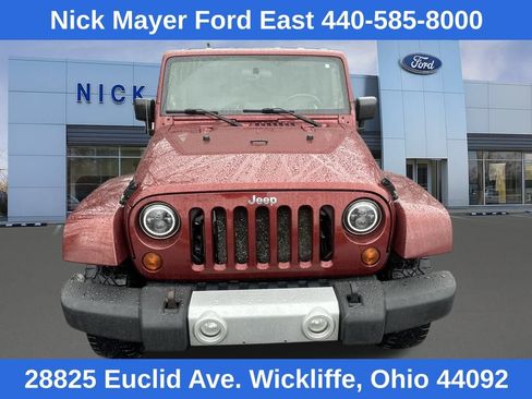 Used 2010 Jeep Wrangler Unlimited Sahara w/ Dual Top Group image 1