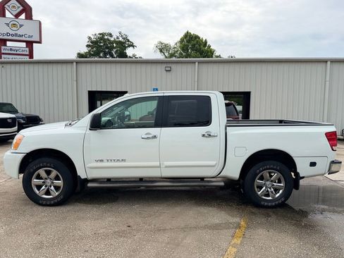 Used 2013 Nissan Titan SV w/ SV Premium Utility Pkg AWD/4WD image 2