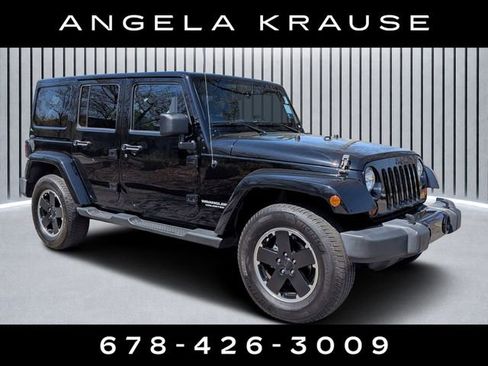 Used 2012 Jeep Wrangler Unlimited Sahara image 1