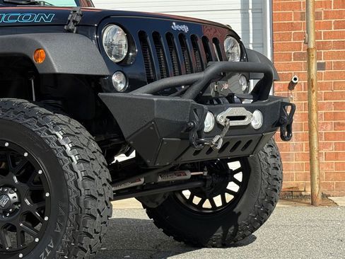 Used 2015 Jeep Wrangler Unlimited Rubicon w/ Dual Top Group AWD/4WD image 32