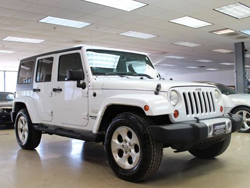 Used 2013 Jeep Wrangler Unlimited Sahara w/ Connectivity Group AWD/4WD image 2