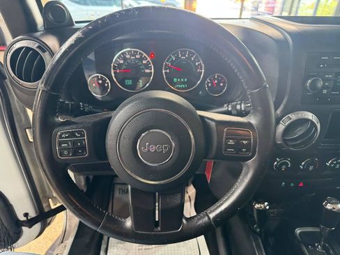Used 2012 Jeep Wrangler Unlimited Sport w/ Connectivity Group AWD/4WD image 25
