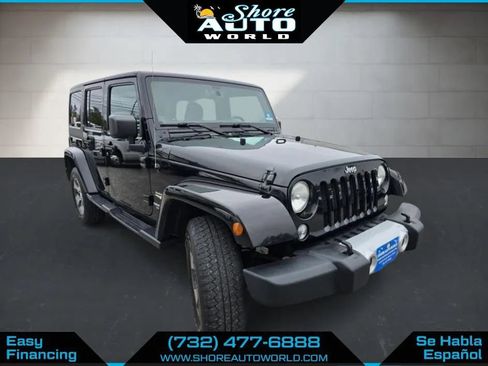 Used 2014 Jeep Wrangler Unlimited Sahara w/ Dual Top Group AWD/4WD image 3