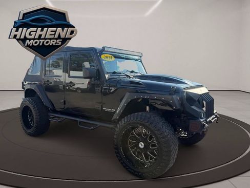 Used 2014 Jeep Wrangler Unlimited Rubicon w/ Dual Top Group AWD/4WD image 8