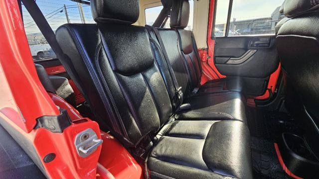 Used 2013 Jeep Wrangler Unlimited Sahara AWD/4WD image 34