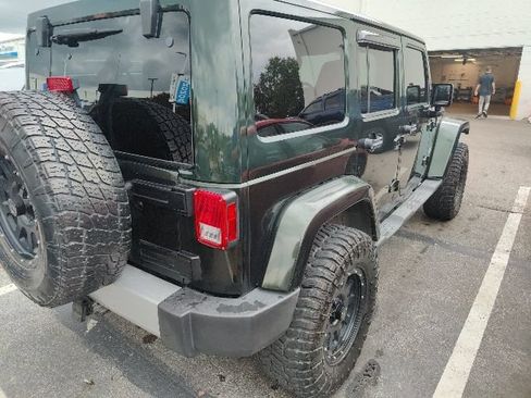 Used 2011 Jeep Wrangler Unlimited Sahara w/ Dual Top Group AWD/4WD image 11