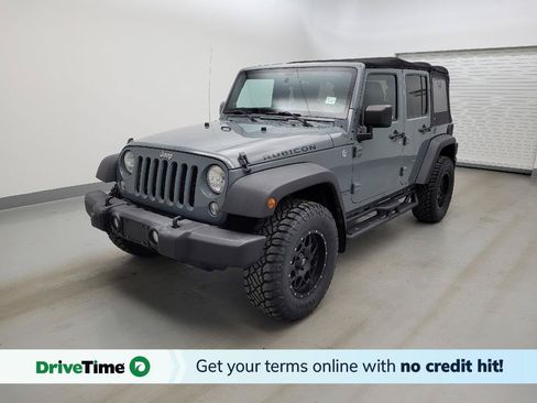 Used 2014 Jeep Wrangler Unlimited Rubicon w/ Dual Top Group AWD/4WD image 1