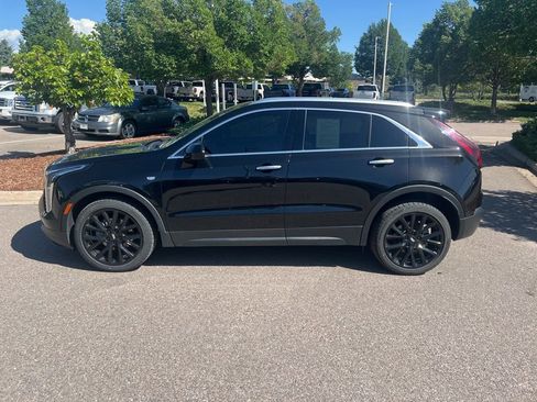 Used 2023 Cadillac XT4 Luxury w/ LPO, Onyx Lite Package AWD/4WD image 2