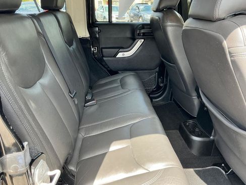 Used 2014 Jeep Wrangler Unlimited Sahara w/ Katzin Premium Leather Group AWD/4WD image 11