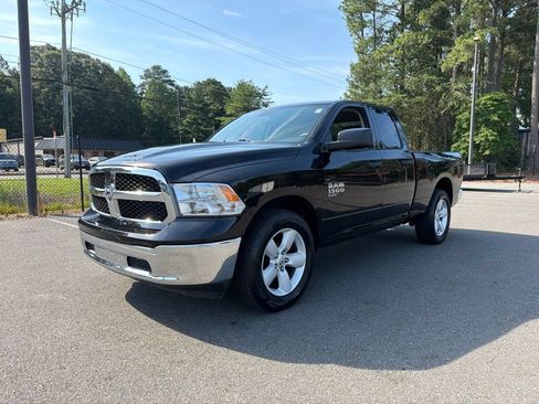 Used 2024 RAM 1500 Classic SLT AWD/4WD image 1